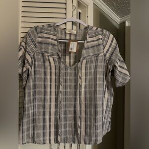 Ladies top, grayish blue and cream striped.